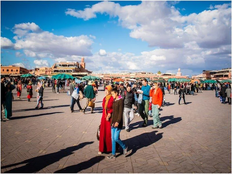 Woman traveler exploring the colorful streets of Marrakech, Morocco