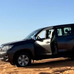 4WD vehicle exploring remote desert tracks near Merzouga