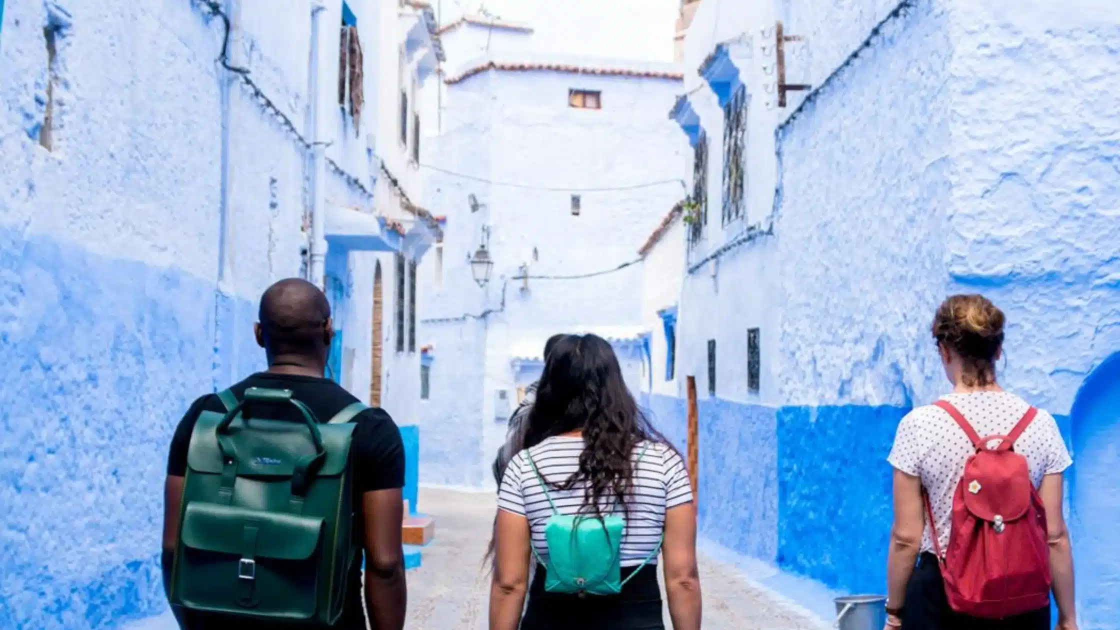 Black American traveler exploring a Moroccan medina